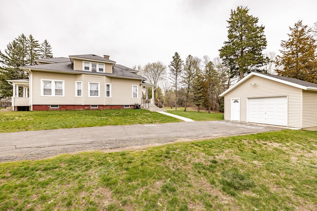695 Amostown Road West Springfield, MA 01089 - Photo 30 of 31 a house view with a outdoor space