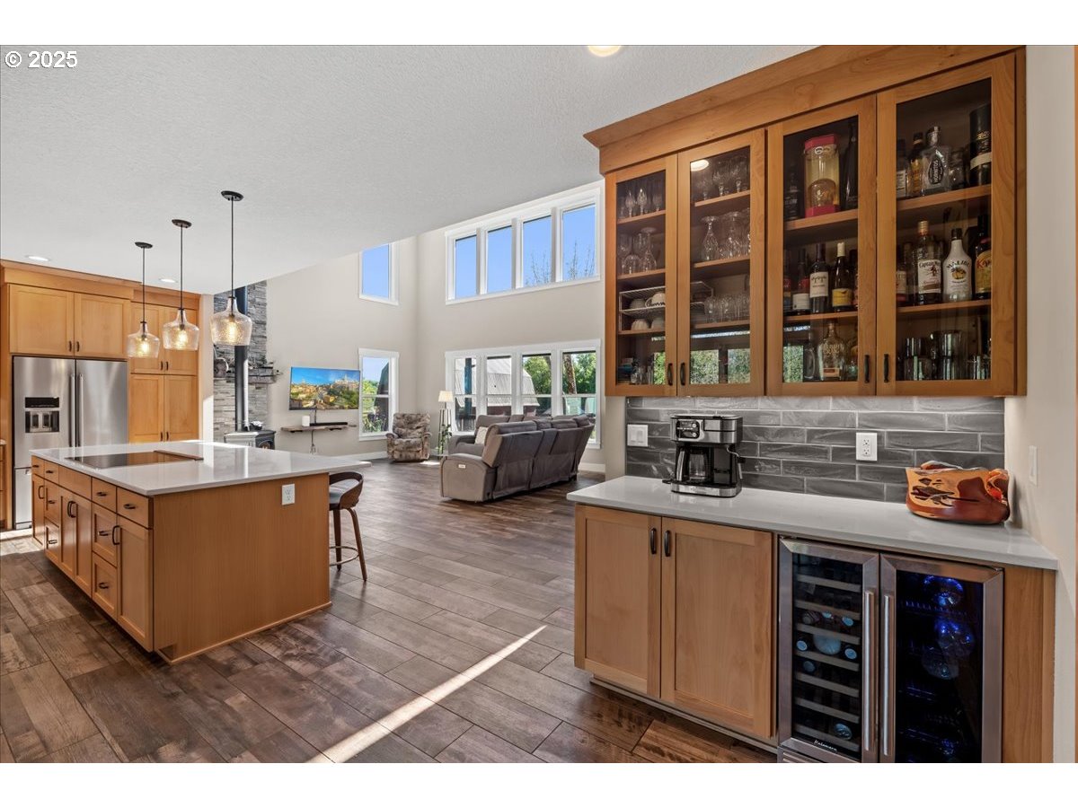 43300 Northwest Cedar Canyon Road Banks, OR 97106 - Photo 11 of 48 a kitchen with stainless steel appliances granite countertop a stove and a sink