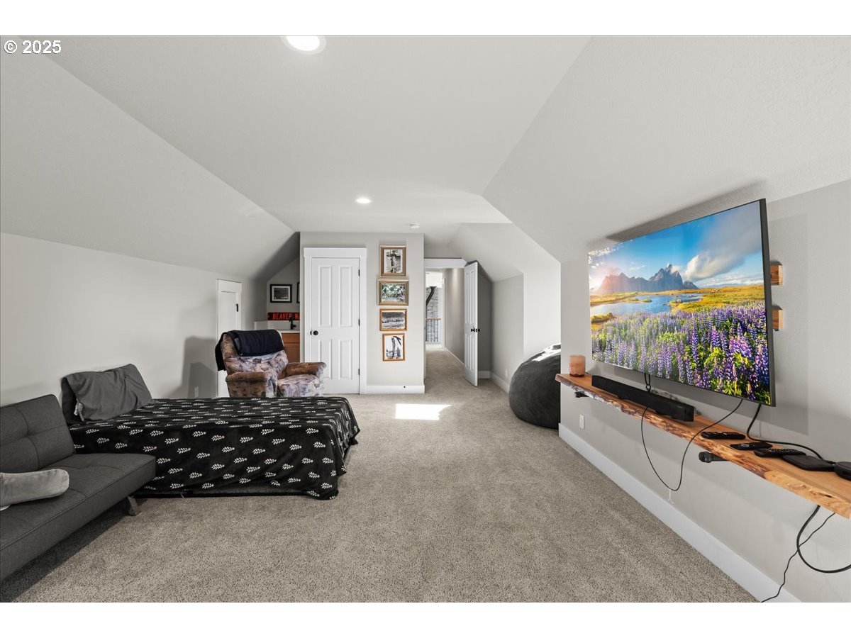 43300 Northwest Cedar Canyon Road Banks, OR 97106 - Photo 21 of 48 a living room with furniture and a flat screen tv