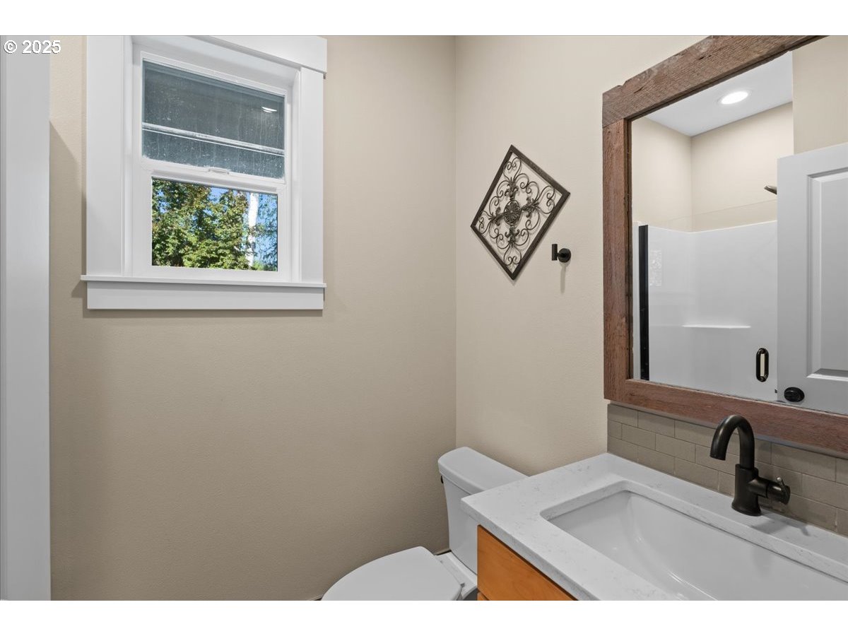 43300 Northwest Cedar Canyon Road Banks, OR 97106 - Photo 24 of 48 a bathroom with a sink and a mirror