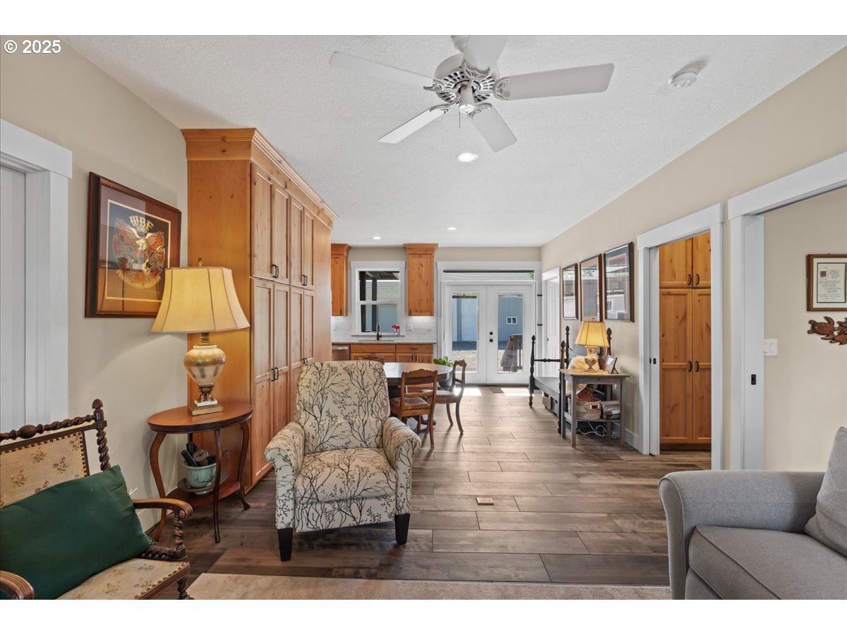 43300 Northwest Cedar Canyon Road Banks, OR 97106 - Photo 28 of 48 a living room with furniture and wooden floor