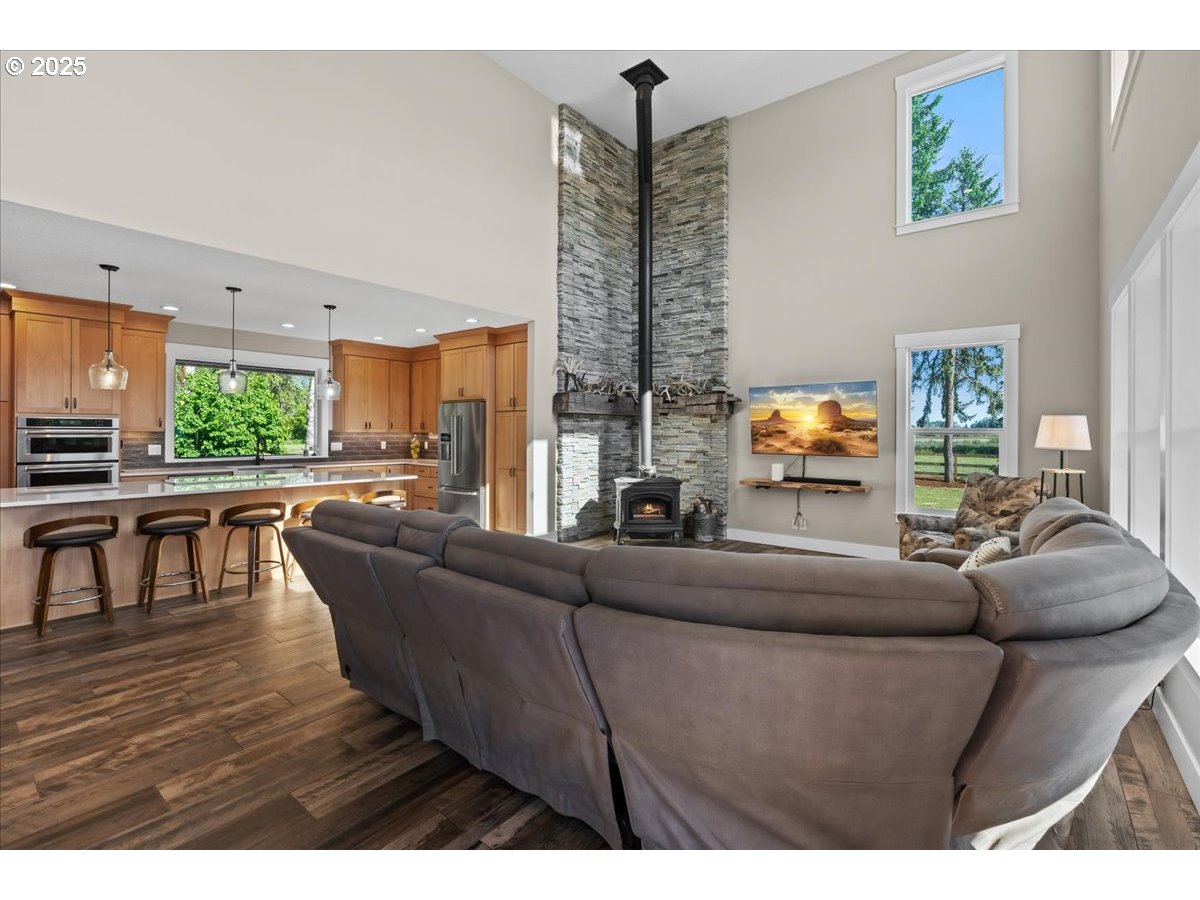43300 Northwest Cedar Canyon Road Banks, OR 97106 - Photo 5 of 48 a living room with furniture and a wooden floor
