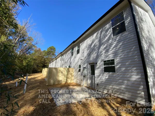 a view of a back yard of the house