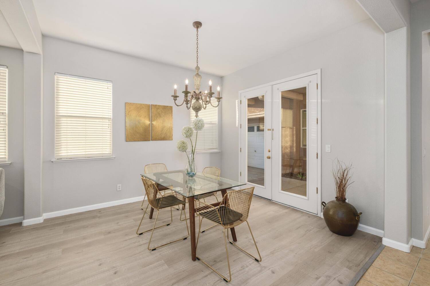 3331 Serena Avenue Clovis, CA 93619 - Photo 13 of 41 a view of a dining room with furniture and window