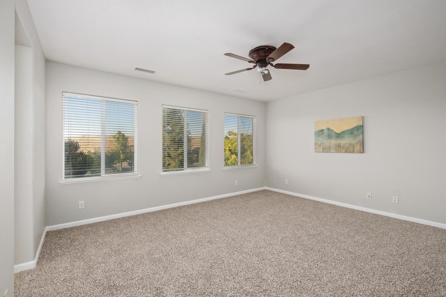 3331 Serena Avenue Clovis, CA 93619 - Photo 27 of 41 a view of an empty room with a window