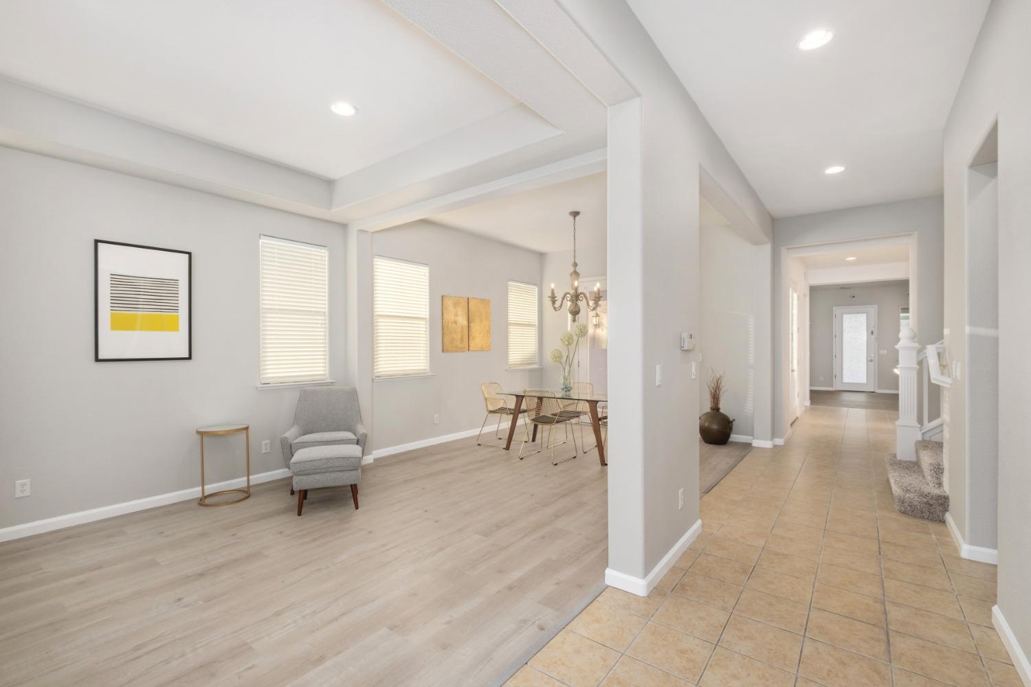 3331 Serena Avenue Clovis, CA 93619 - Photo 4 of 41 a view of a livingroom with lounge chairs and a large window