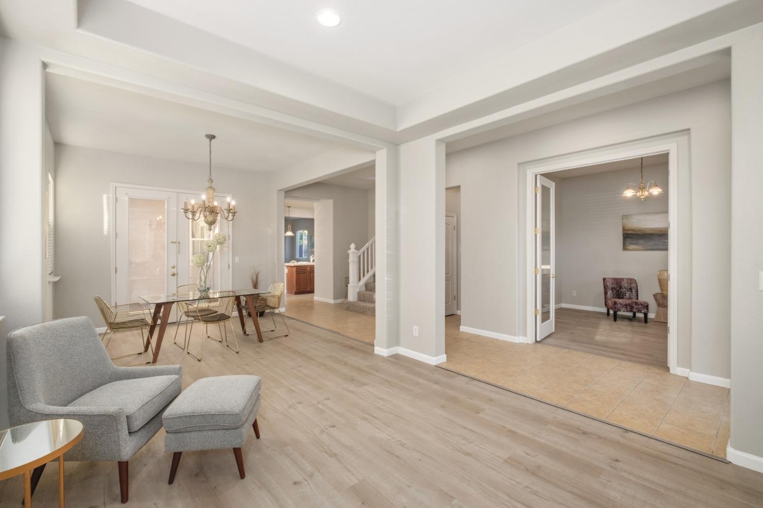 3331 Serena Avenue Clovis, CA 93619 - Photo 5 of 41 a living room with furniture and a dining table