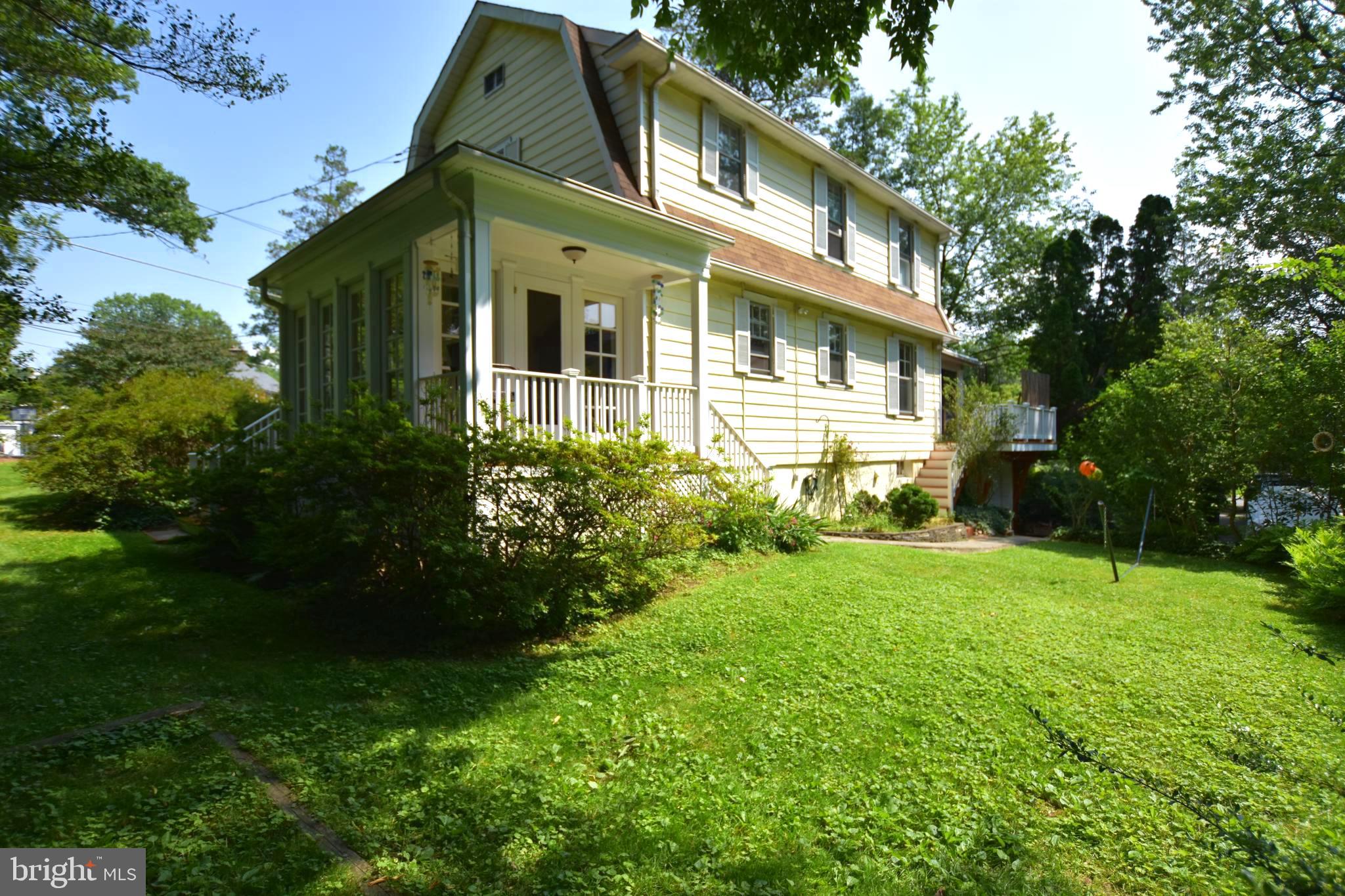 1300 Noyes Drive Silver Spring, MD 20910 - Photo 25 of 30 a front view of a house with garden