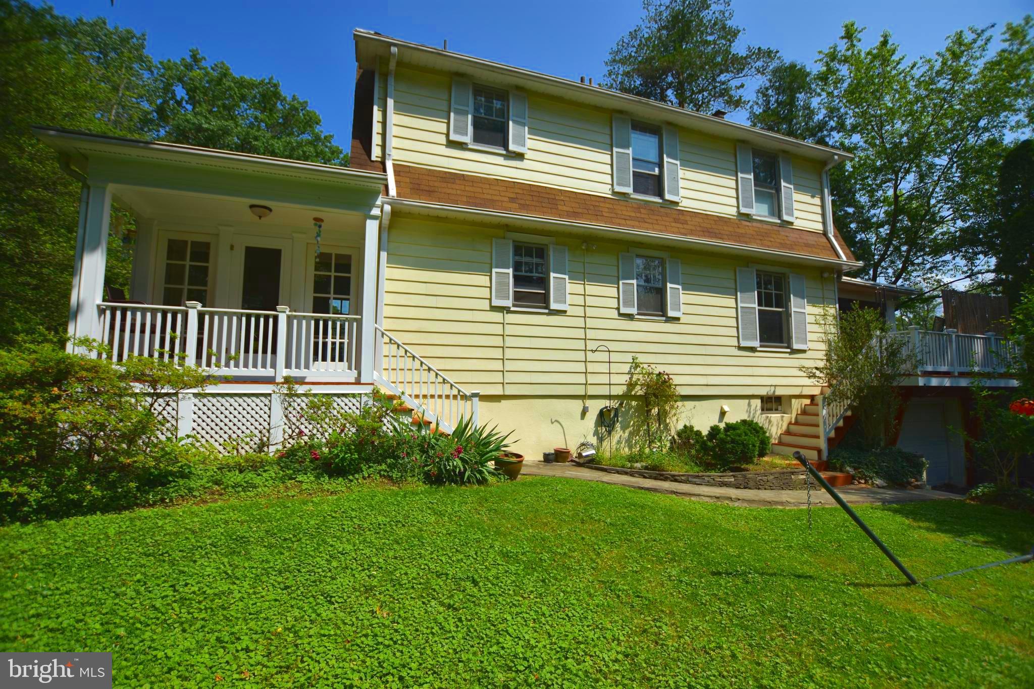 1300 Noyes Drive Silver Spring, MD 20910 - Photo 27 of 30 a front view of a house with garden
