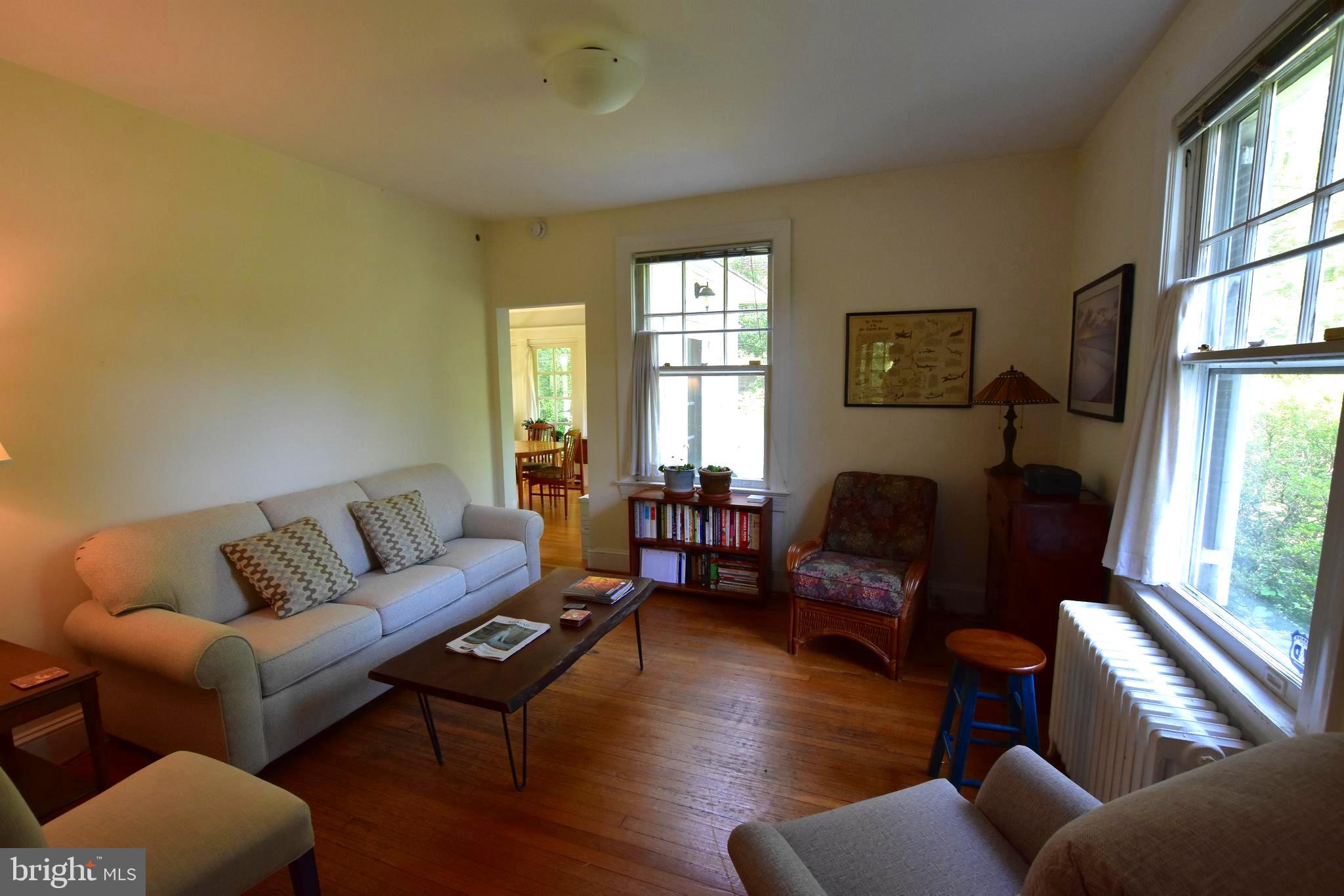 1300 Noyes Drive Silver Spring, MD 20910 - Photo 4 of 30 a living room with furniture wooden floor and a window