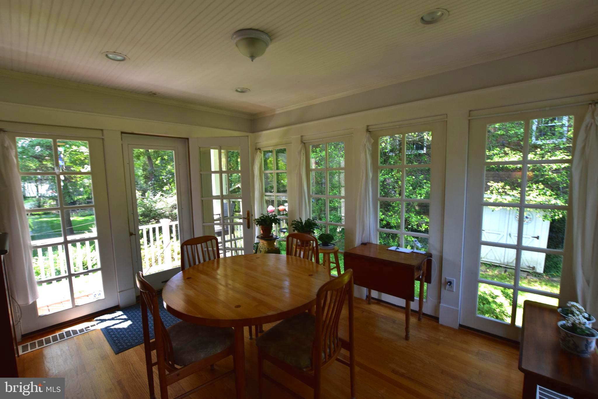1300 Noyes Drive Silver Spring, MD 20910 - Photo 6 of 30 a view of a dining room with furniture window and outside view