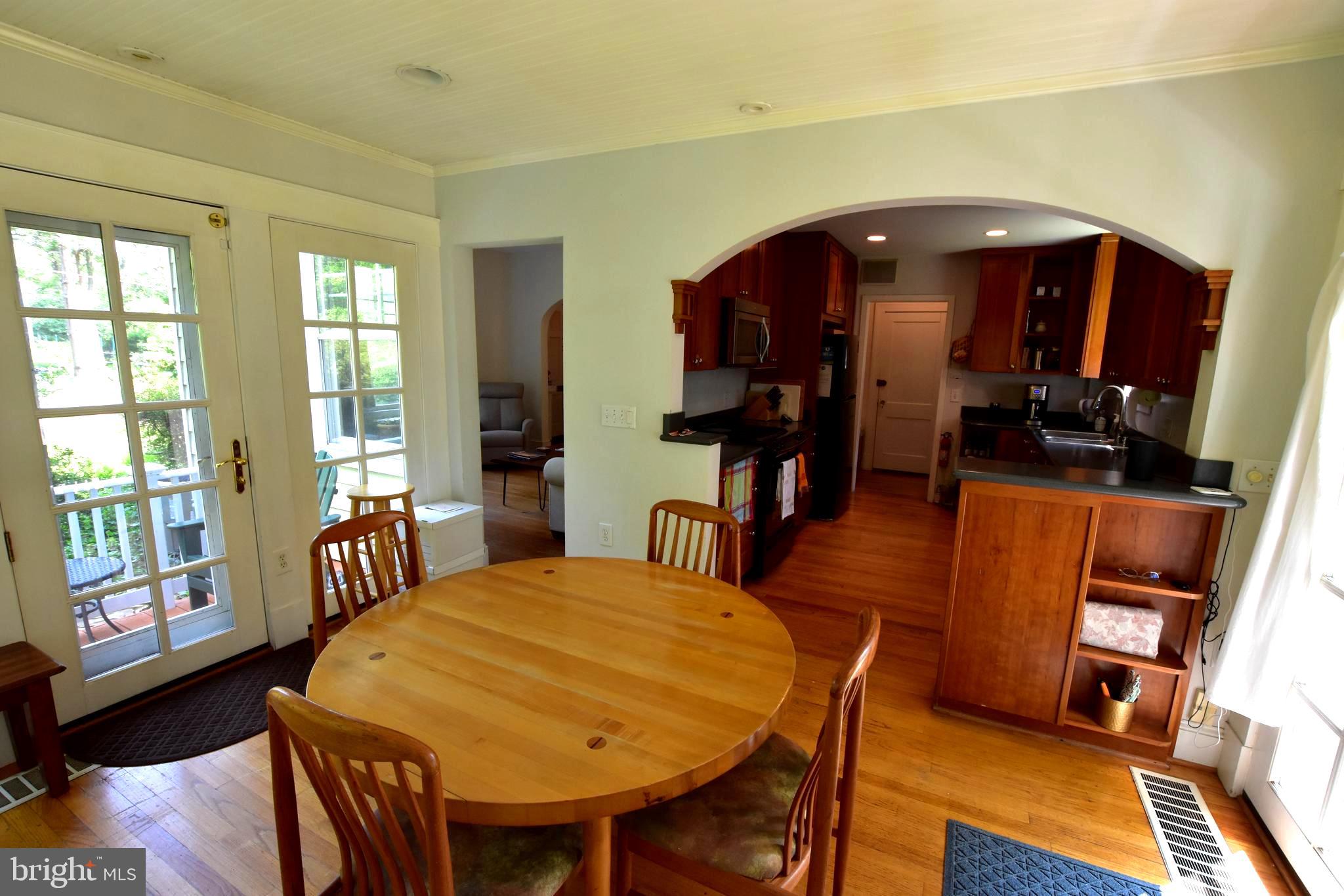 1300 Noyes Drive Silver Spring, MD 20910 - Photo 8 of 30 a dining room with furniture and window