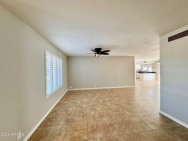 a view of empty room with windows