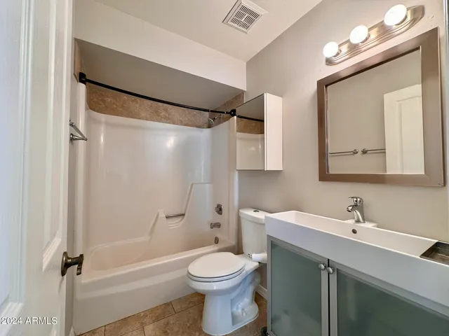 a view of staircase with a large window