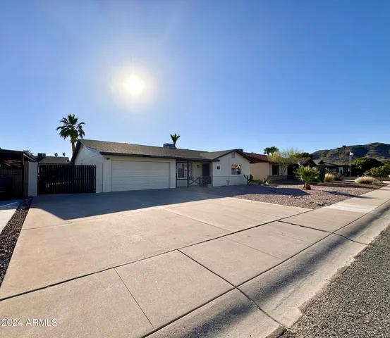 a view of balcony with furniture