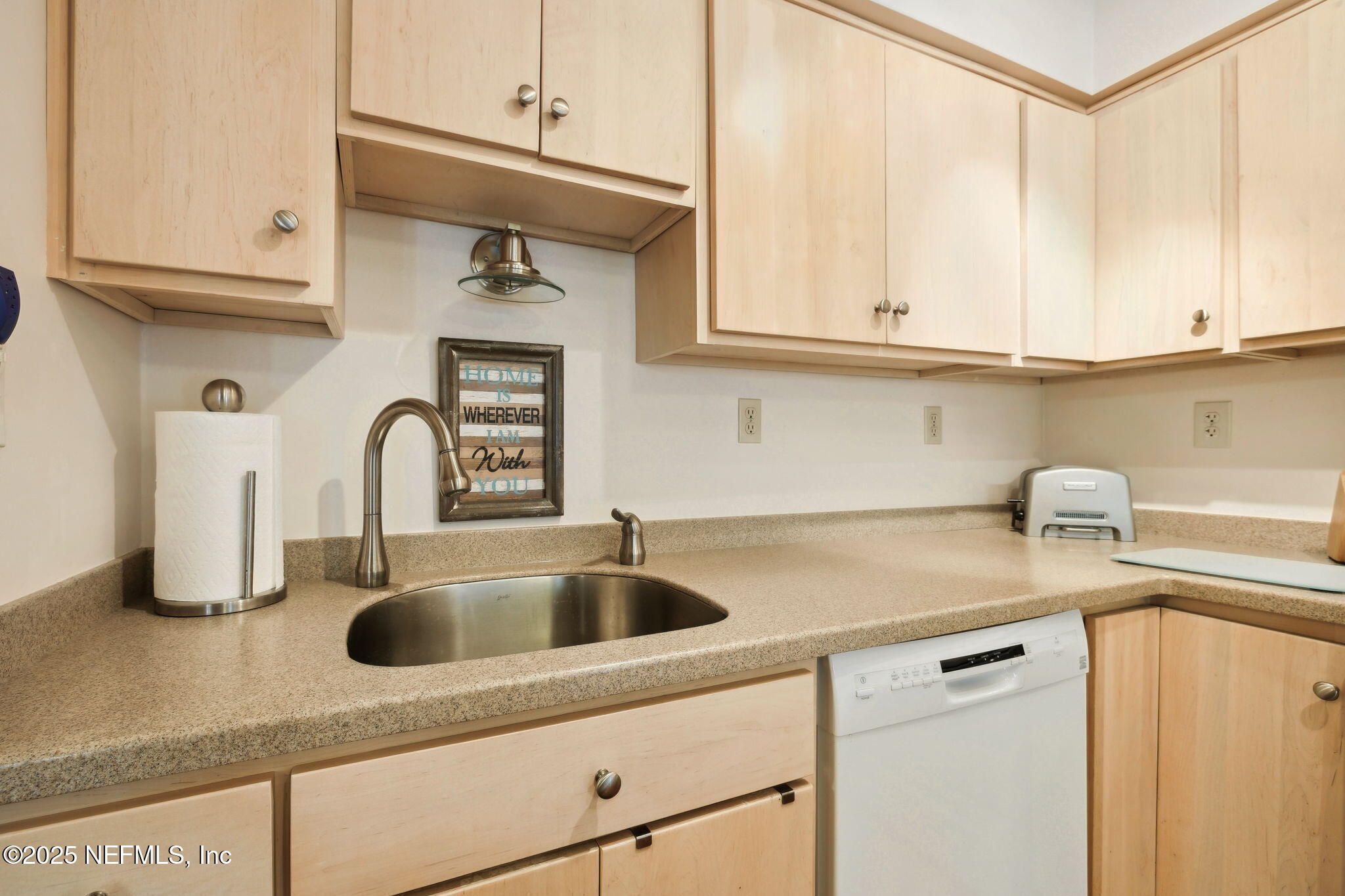 210 River Bend Court, Unit B Welaka, FL 32193 - Photo 14 of 41 a kitchen with stainless steel appliances granite countertop a sink and cabinets