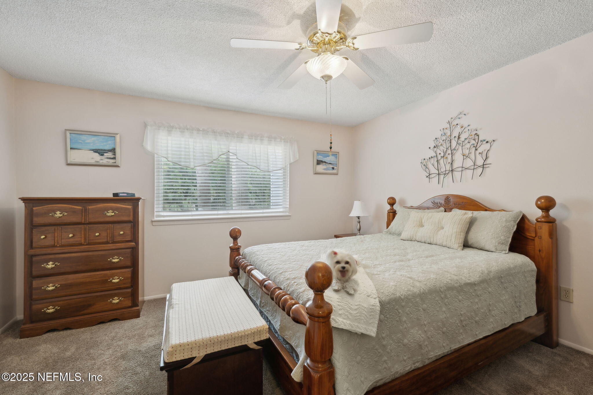 210 River Bend Court, Unit B Welaka, FL 32193 - Photo 15 of 41 a bedroom with a bed and a window