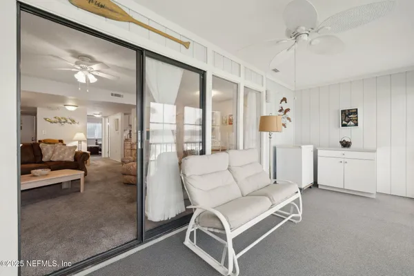 a bathroom with a granite countertop sink toilet a mirror a vanity and shower