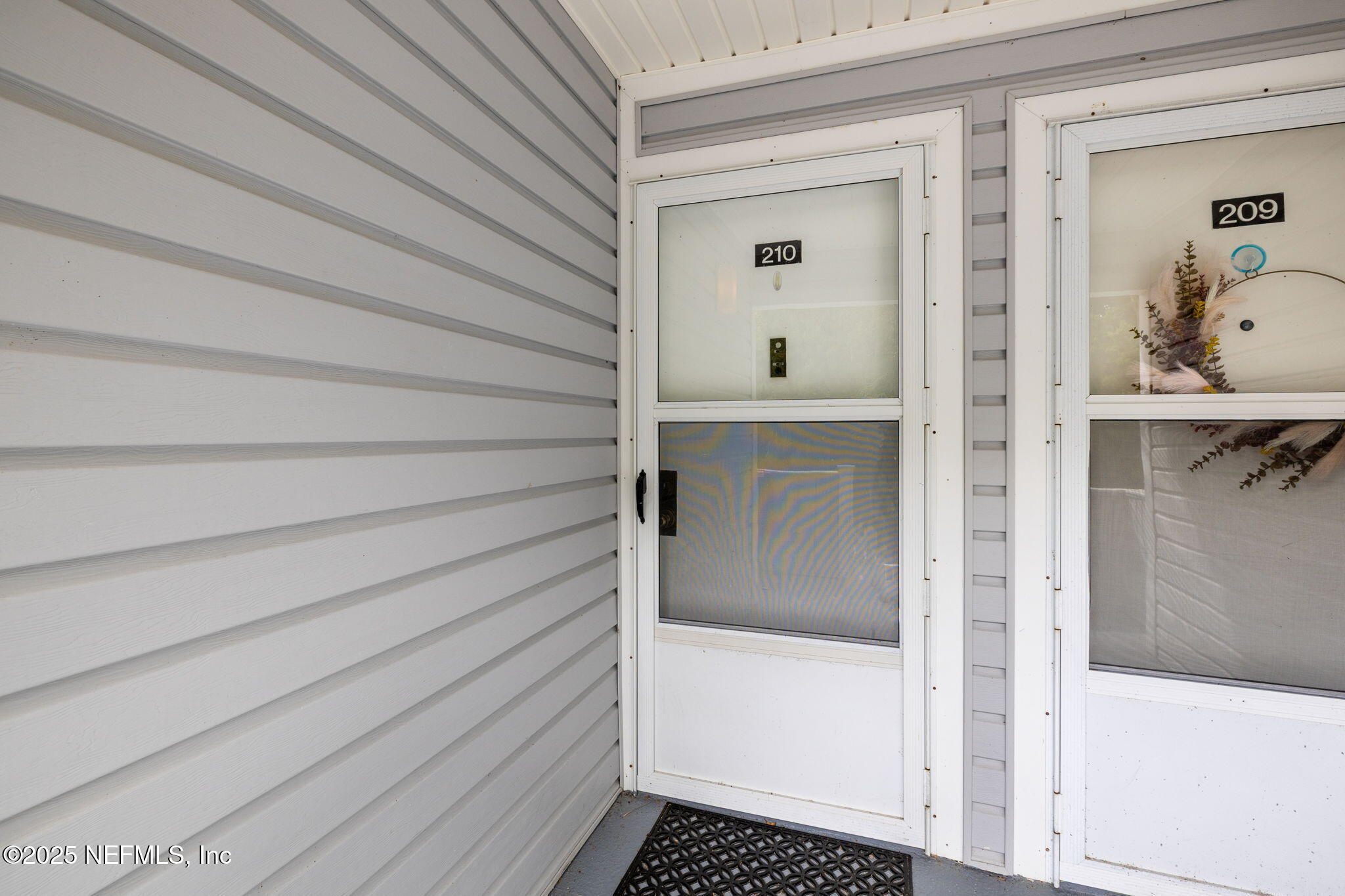 210 River Bend Court, Unit B Welaka, FL 32193 - Photo 37 of 41 a bathroom with a shower