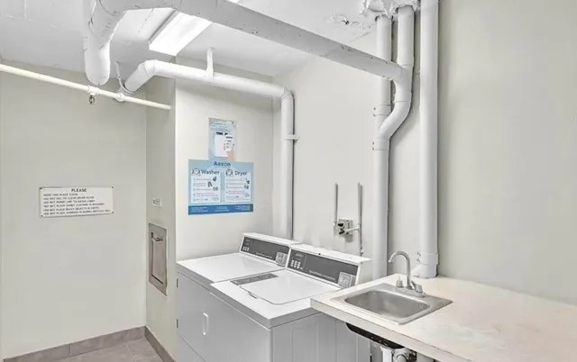 a bathroom with a sink vanity and a mirror
