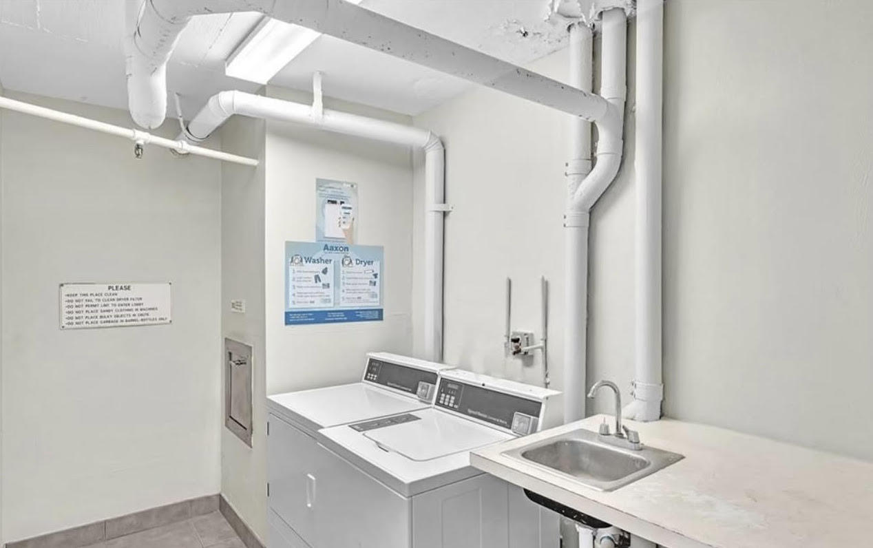 1401 North Riverside Drive, Unit 1205 Pompano Beach, FL 33062 - Photo 11 of 26 a bathroom with a sink vanity and a mirror