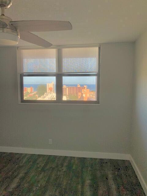 1401 North Riverside Drive, Unit 1205 Pompano Beach, FL 33062 - Photo 16 of 26 an empty room with a window