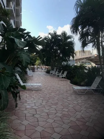 a view of a backyard of the house