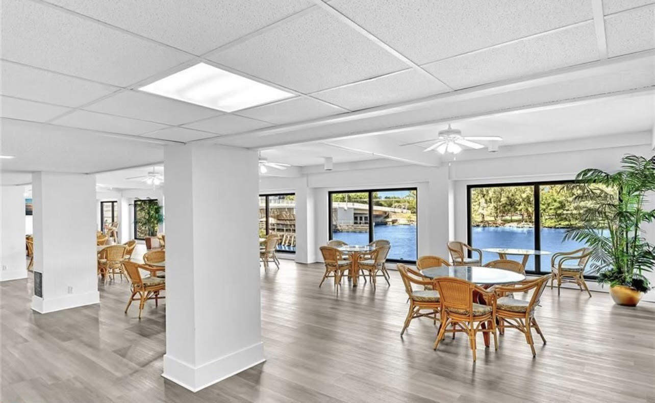 1401 North Riverside Drive, Unit 1205 Pompano Beach, FL 33062 - Photo 3 of 26 a view of a dining room with furniture window and outside view