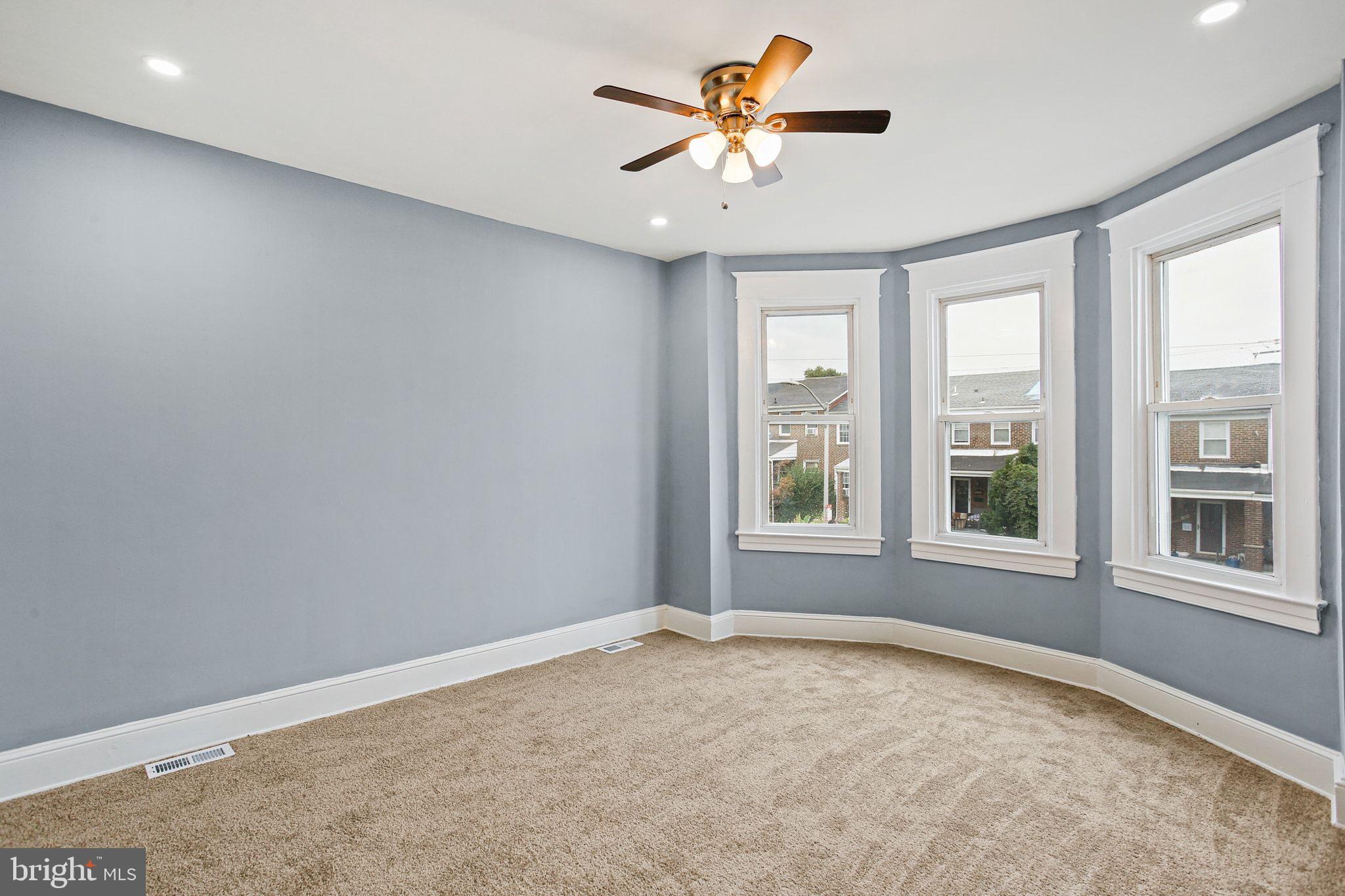 2811 Erdman Avenue Baltimore, MD 21213 - Photo 16 of 31 a view of an empty room with a window
