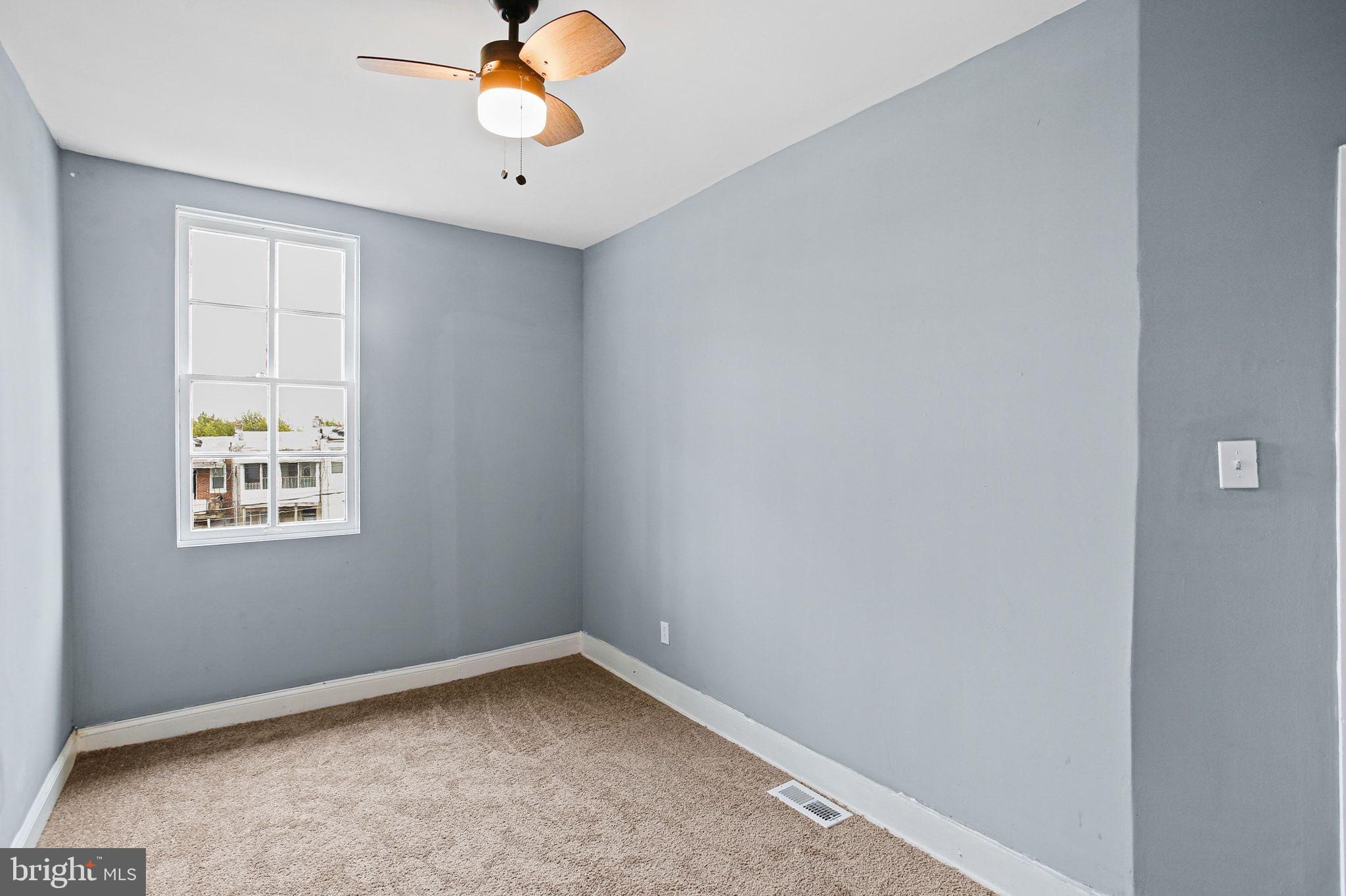 2811 Erdman Avenue Baltimore, MD 21213 - Photo 18 of 31 an empty room with window