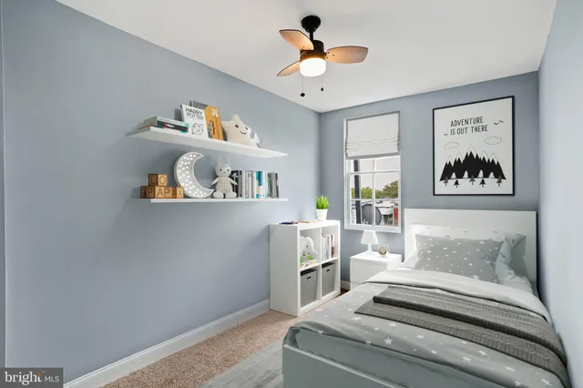 a living room with furniture and window
