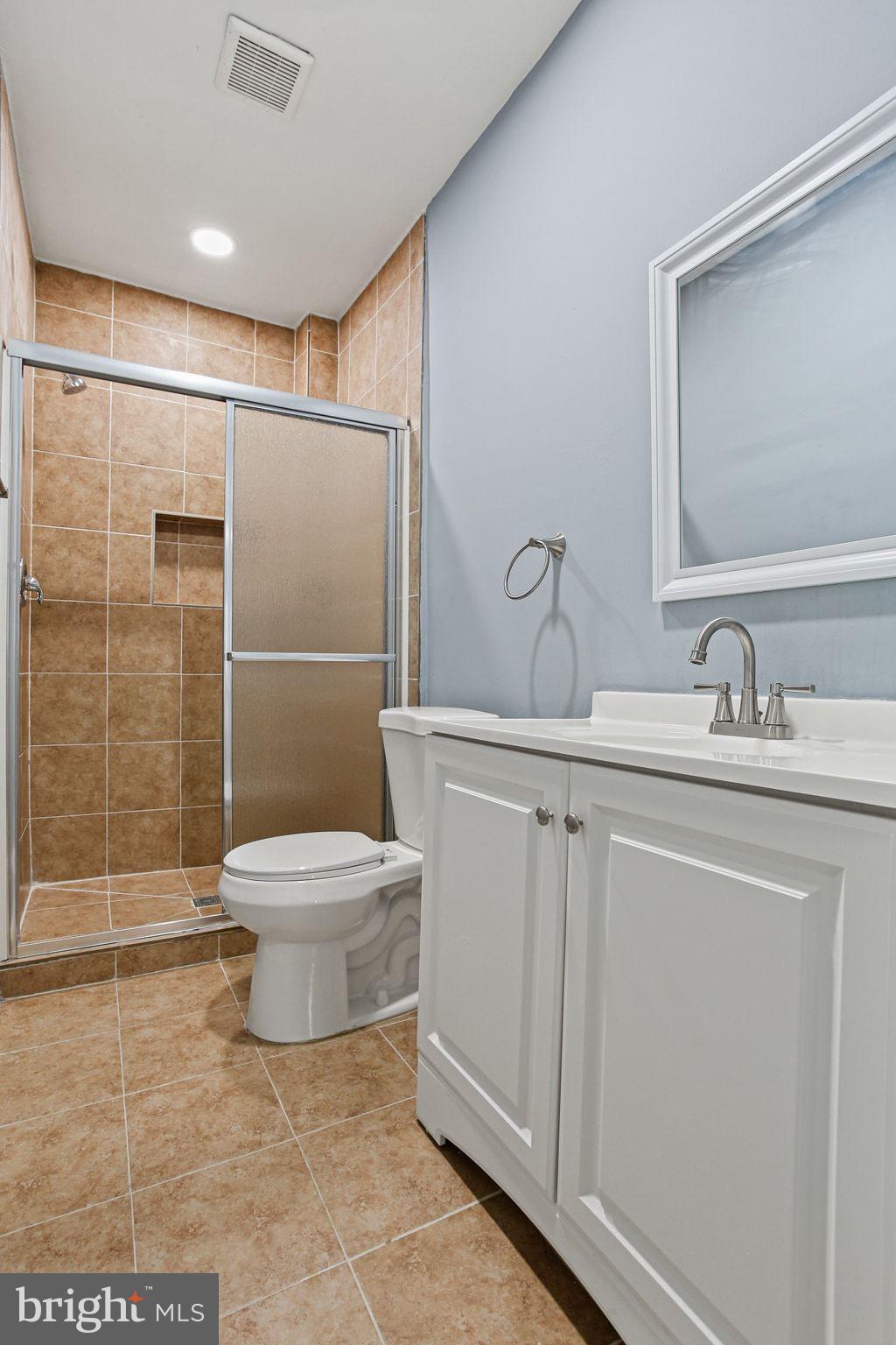 2811 Erdman Avenue Baltimore, MD 21213 - Photo 25 of 31 a bathroom with a toilet sink and a shower