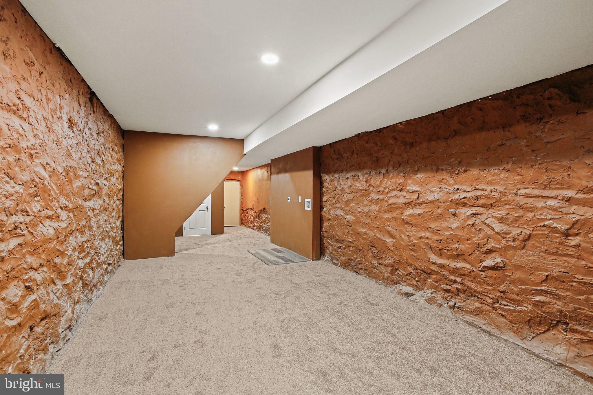 2811 Erdman Avenue Baltimore, MD 21213 - Photo 31 of 31 a view of a big room with closet and a window