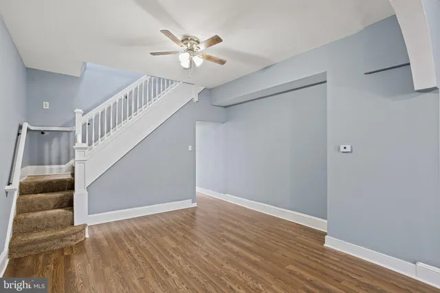 a view of entryway with wooden floor