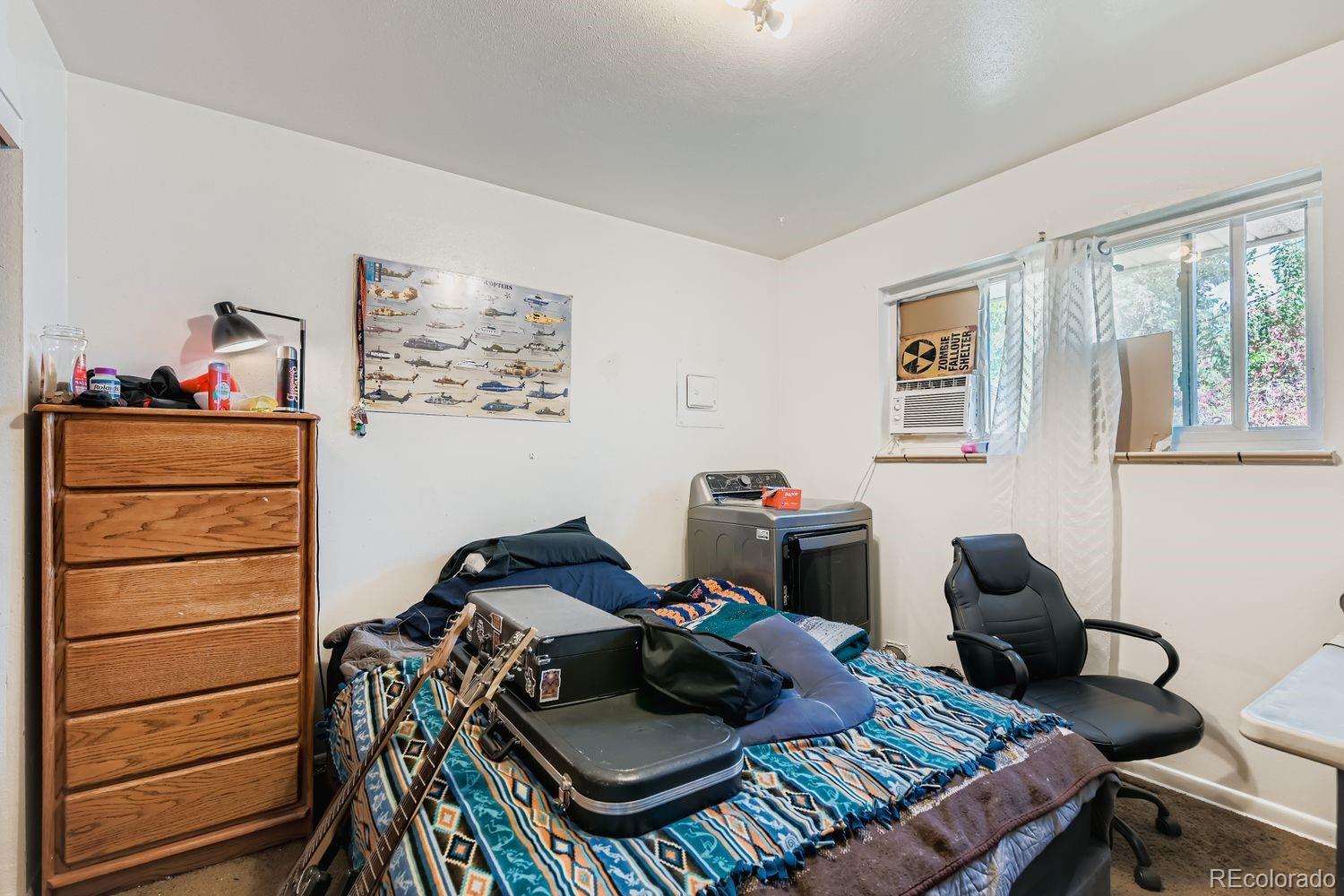 315 6th Street Fort Lupton, CO 80621 - Photo 14 of 26 a view of a workspace with furniture