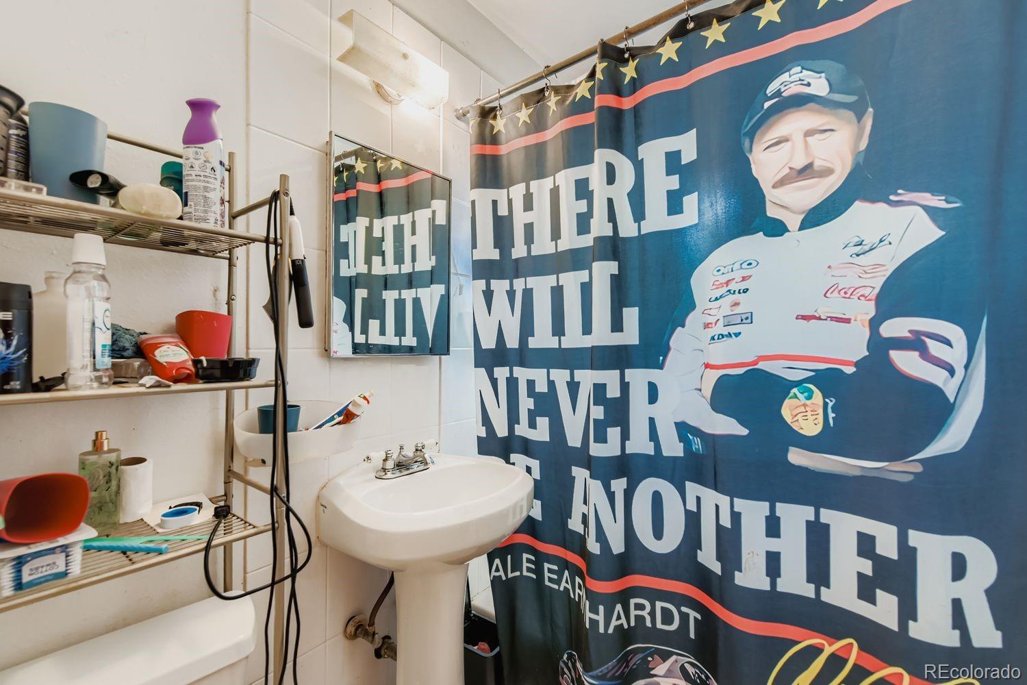 315 6th Street Fort Lupton, CO 80621 - Photo 19 of 26 a front view of a dining room with furniture and toys