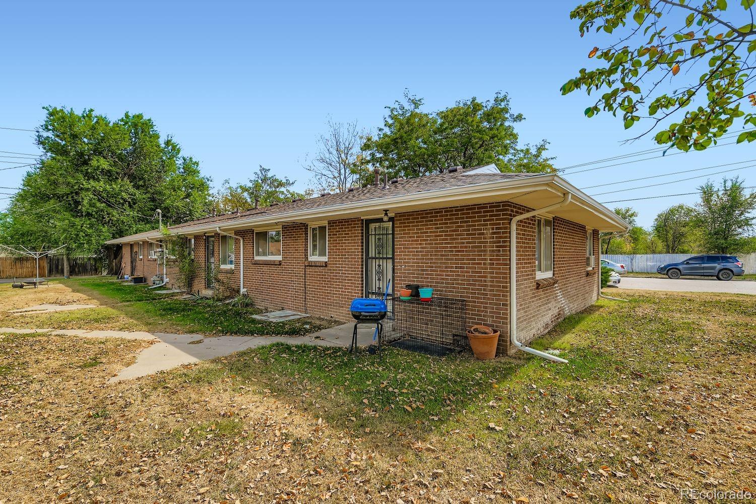 315 6th Street Fort Lupton, CO 80621 - Photo 2 of 26 a view of a house with backyard