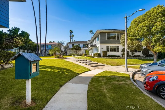 a view of a house with swimming pool yard and patio