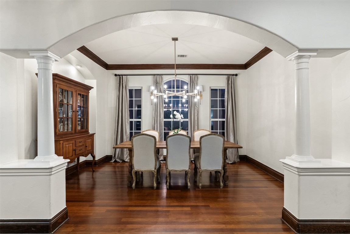 12027 Pleasant Panorama View Austin, TX 78738 - Photo 11 of 40 a view of a dining room with furniture window and wooden floor