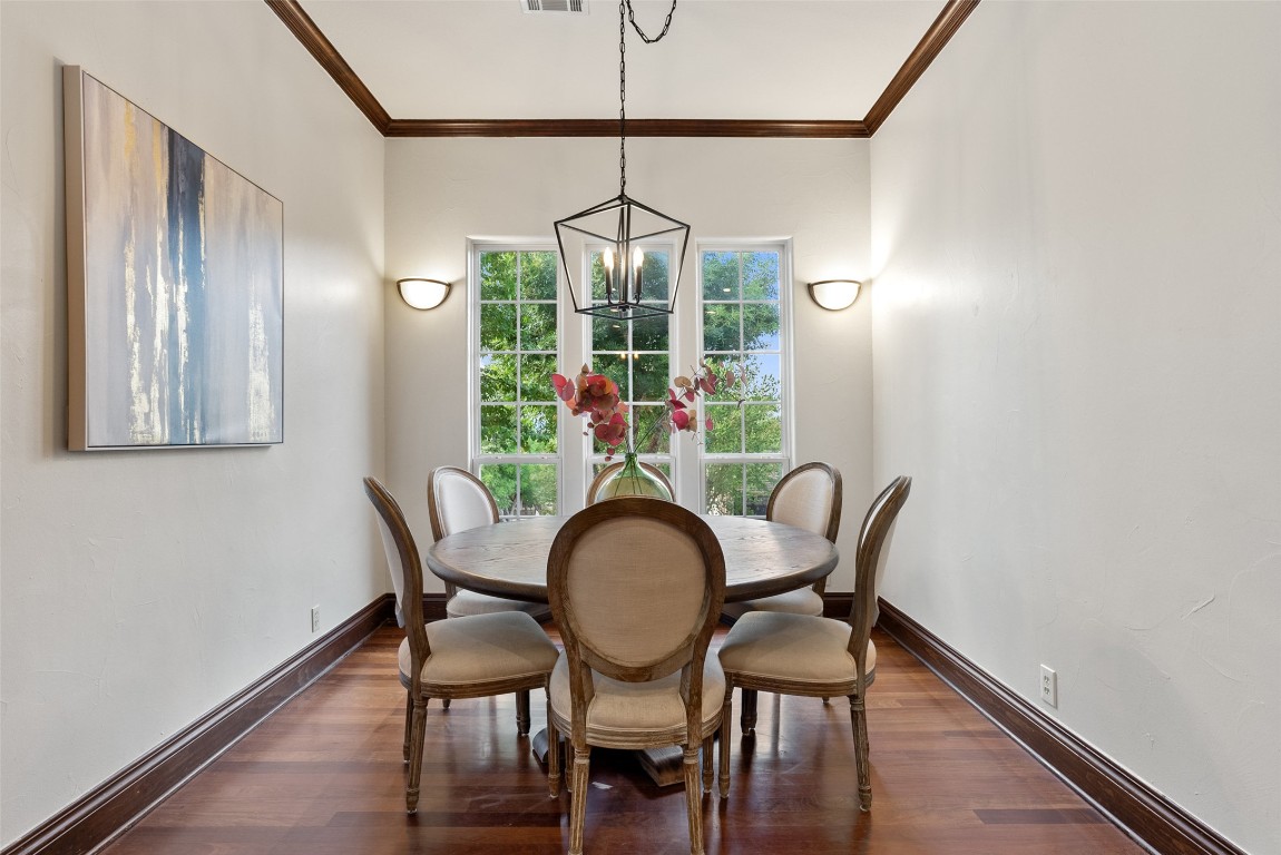 12027 Pleasant Panorama View Austin, TX 78738 - Photo 13 of 40 a view of a dining room with furniture window and wooden floor