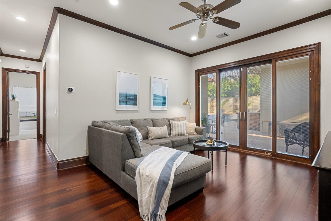 12027 Pleasant Panorama View Austin, TX 78738 - Photo 20 of 40 a living room with furniture and a large window