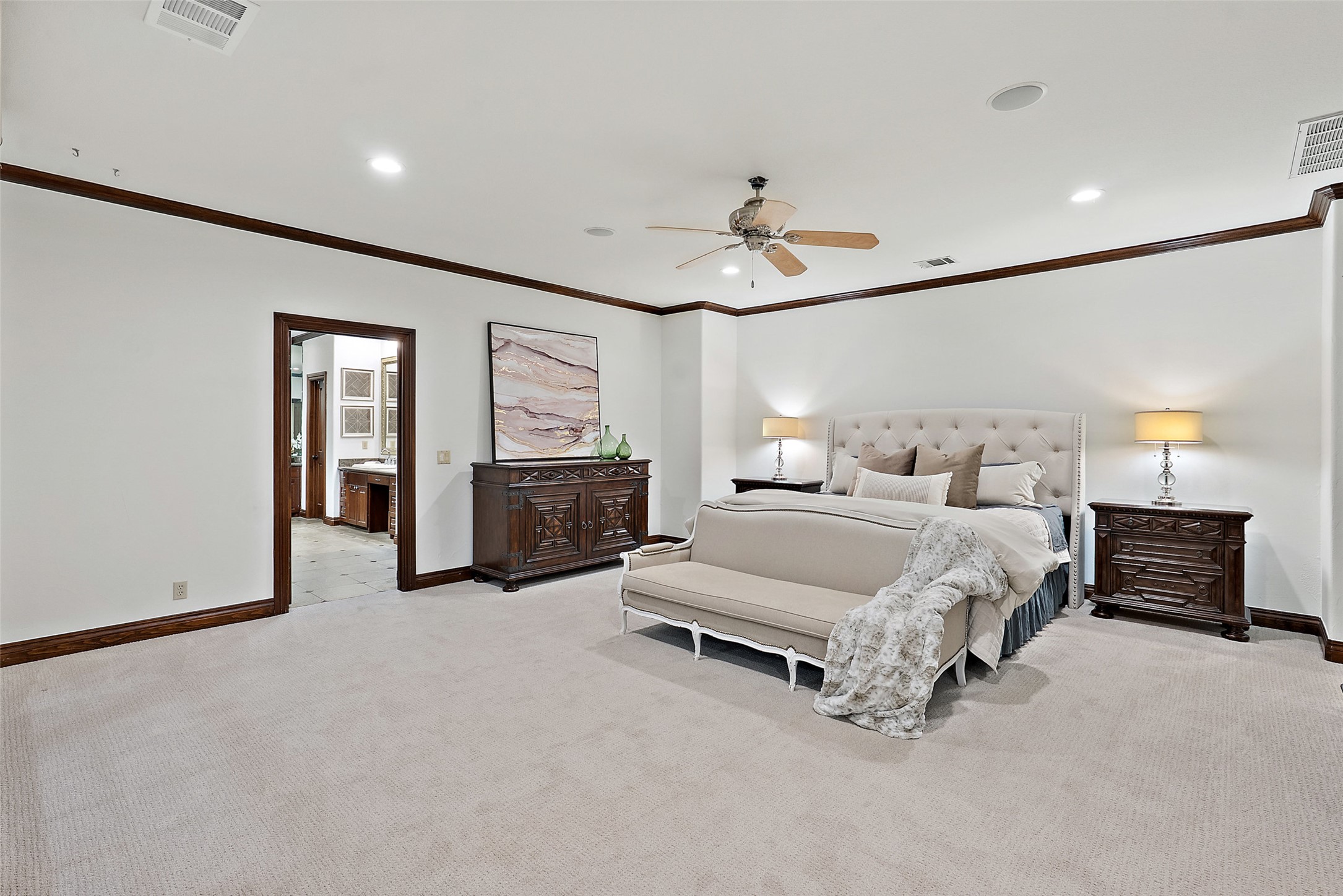 12027 Pleasant Panorama View Austin, TX 78738 - Photo 24 of 40 Primary bedroom. Located on the top floor, just 1/2 flight up from the game room/bedroom level, and 1 flight up from main level.