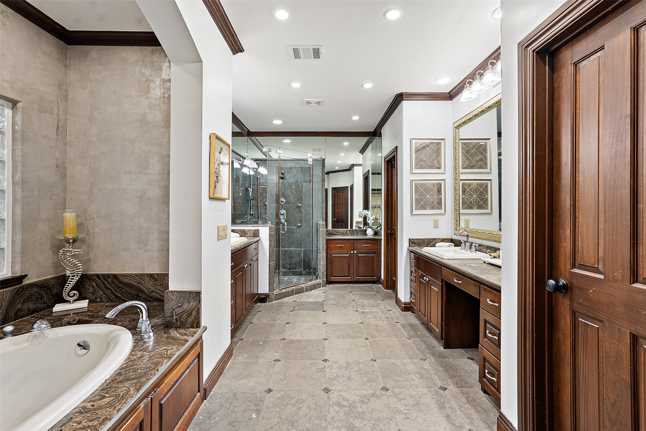 12027 Pleasant Panorama View Austin, TX 78738 - Photo 29 of 40 Primary bathroom with double sinks, vanity, and plenty of storage