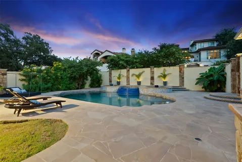 a view of front door and porch with wooden floor