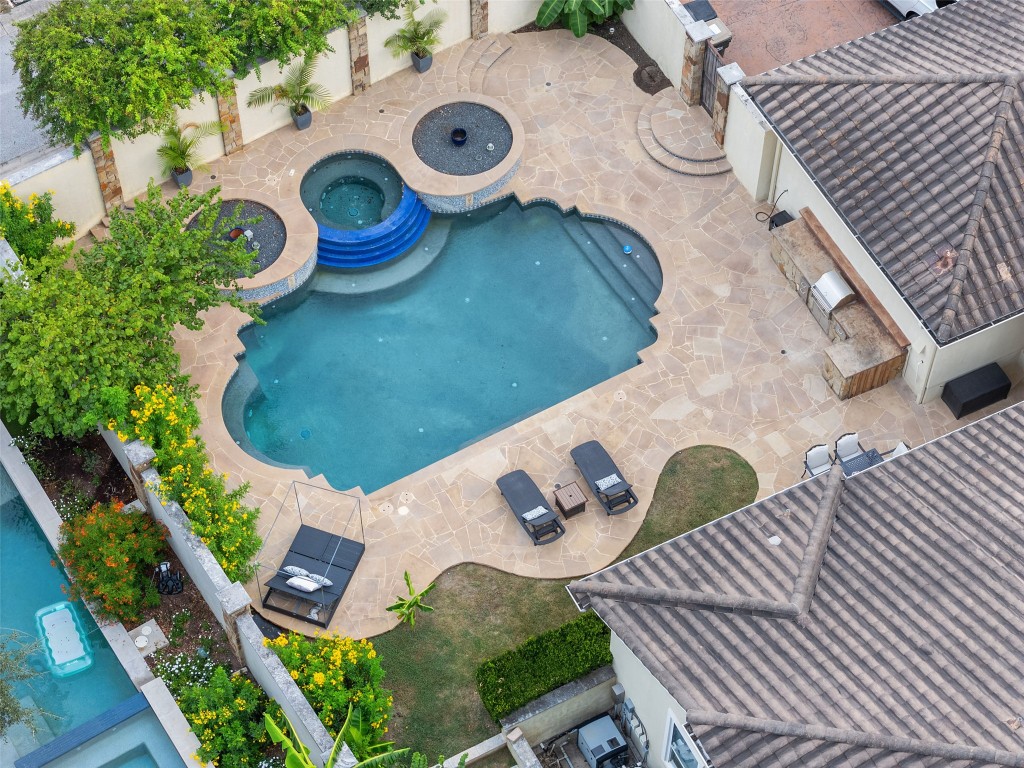 12027 Pleasant Panorama View Austin, TX 78738 - Photo 35 of 40 an aerial view of a house with garden space and sitting space