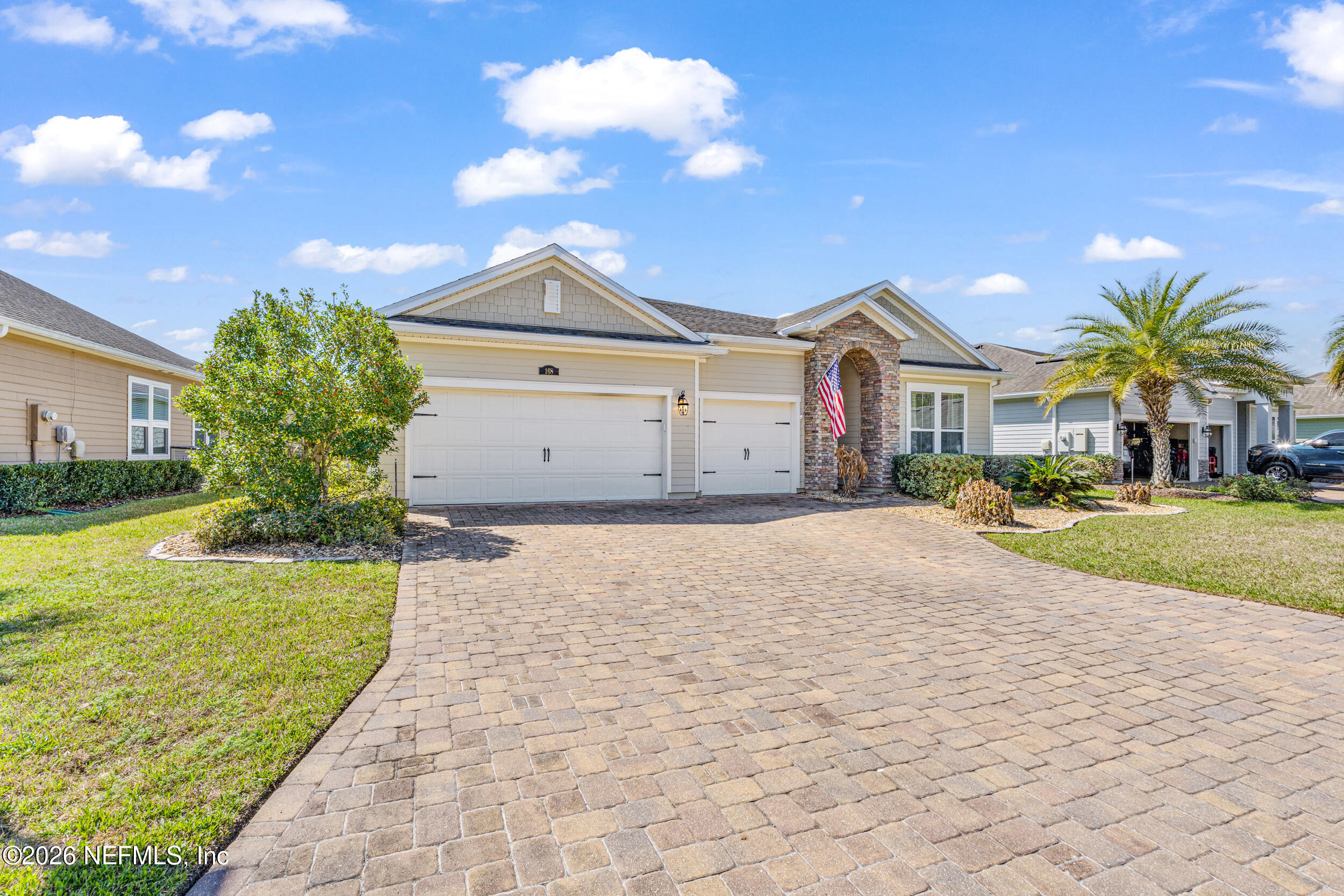 168 St Kitts Loop St. Augustine, FL 32092 - Photo 2 of 47 a view of a house with a yard