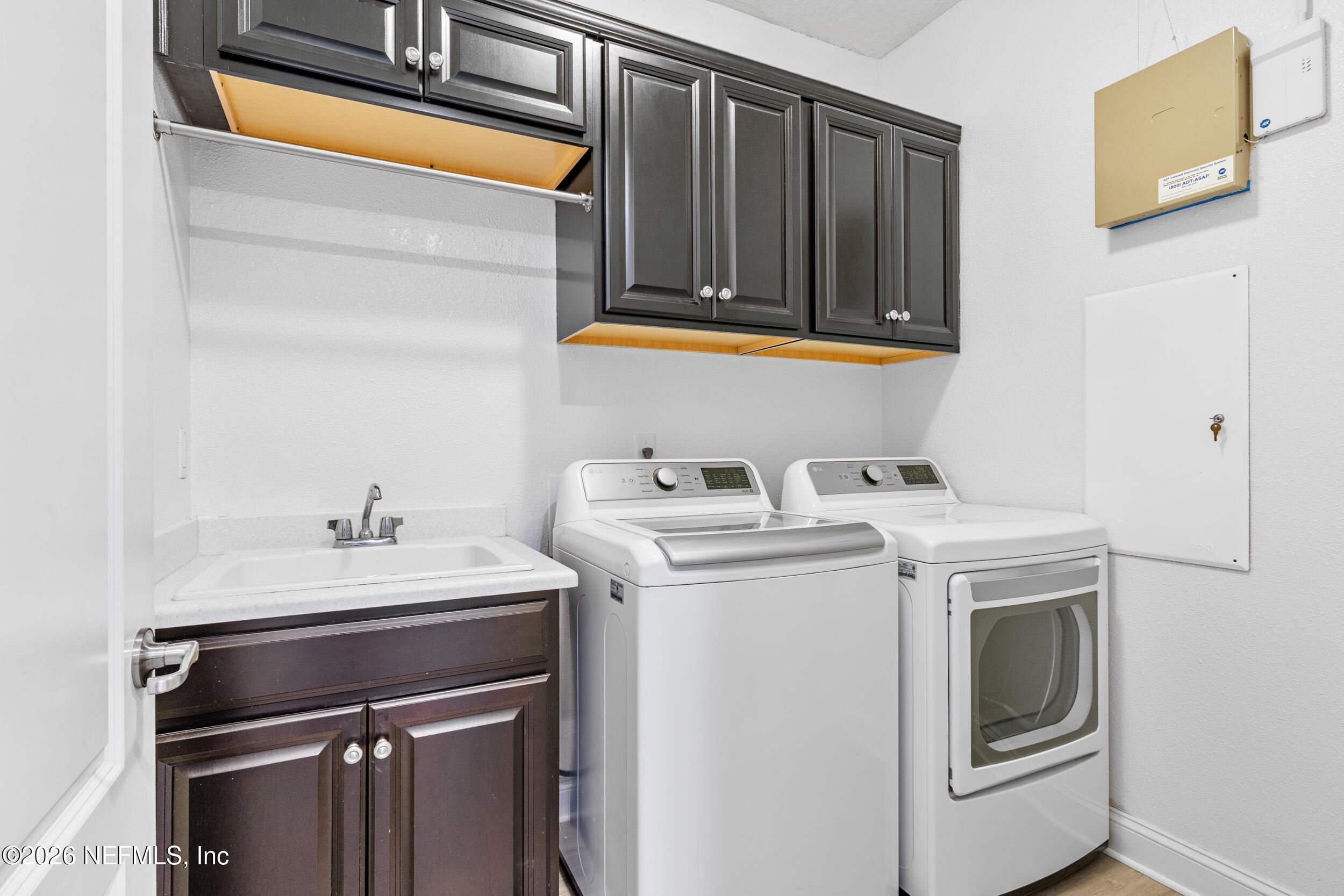 168 St Kitts Loop St. Augustine, FL 32092 - Photo 28 of 47 a utility room with dryer and washer