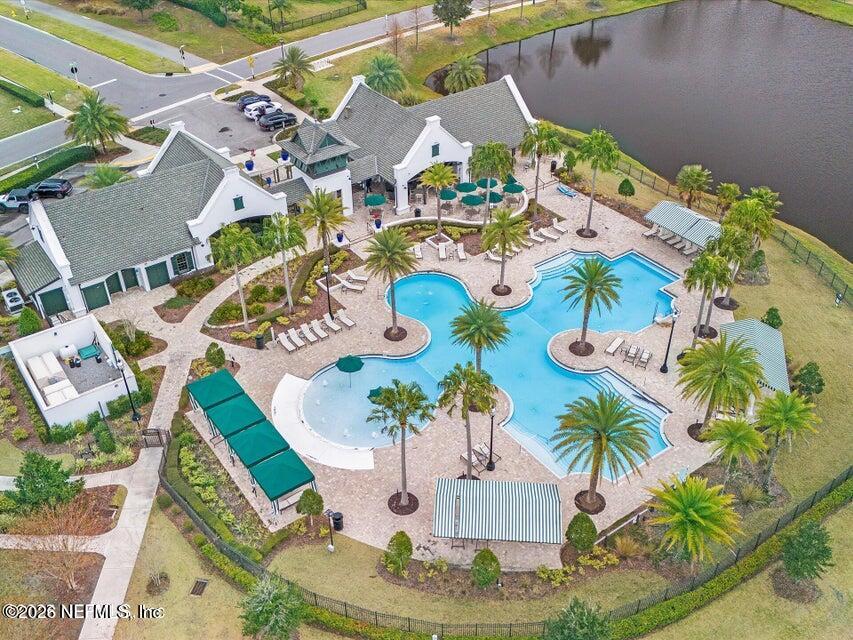 168 St Kitts Loop St. Augustine, FL 32092 - Photo 40 of 47 an aerial view of a house with a swimming pool