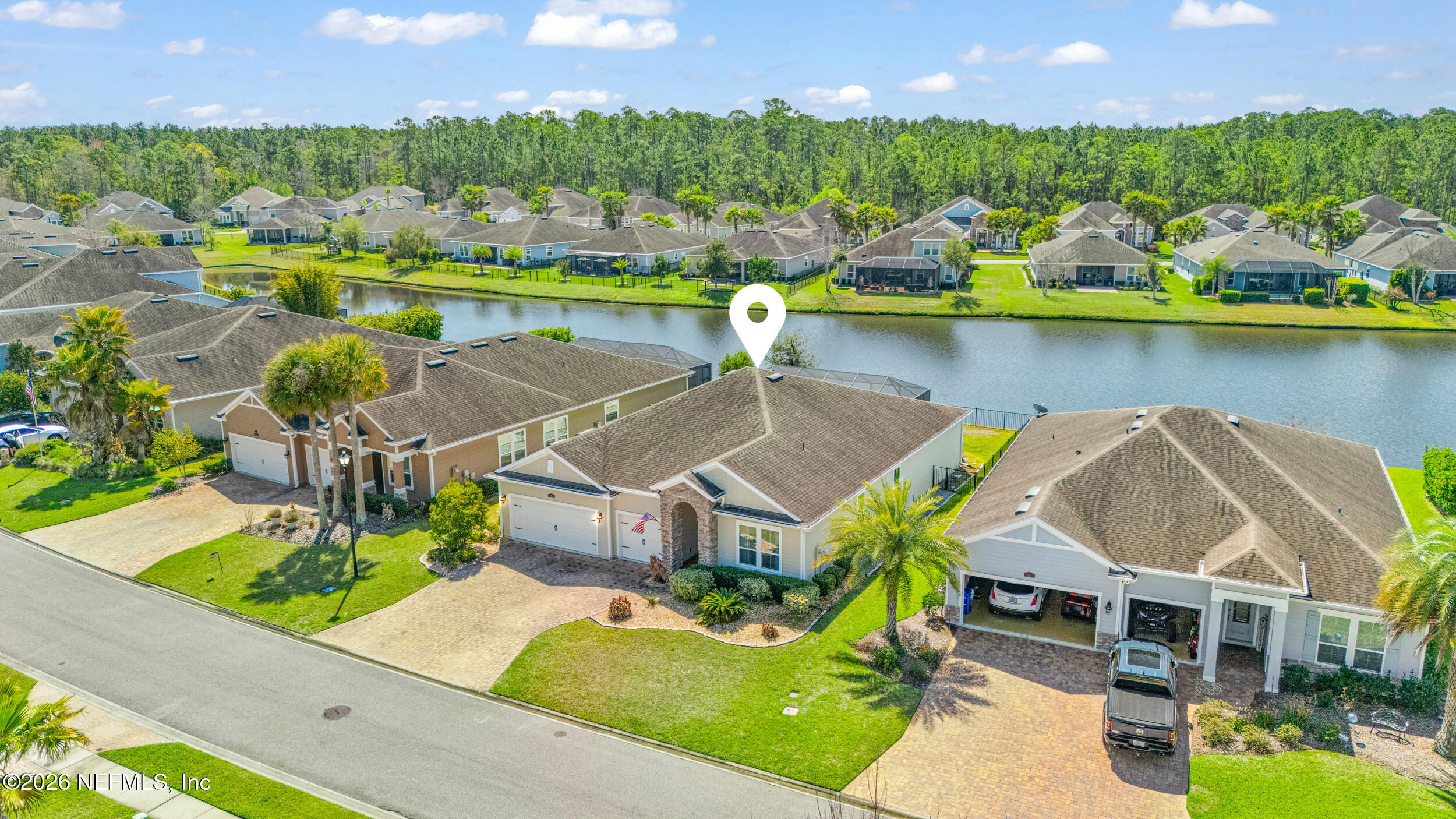 168 St Kitts Loop St. Augustine, FL 32092 - Photo 4 of 47 an aerial view of a house with a lake view