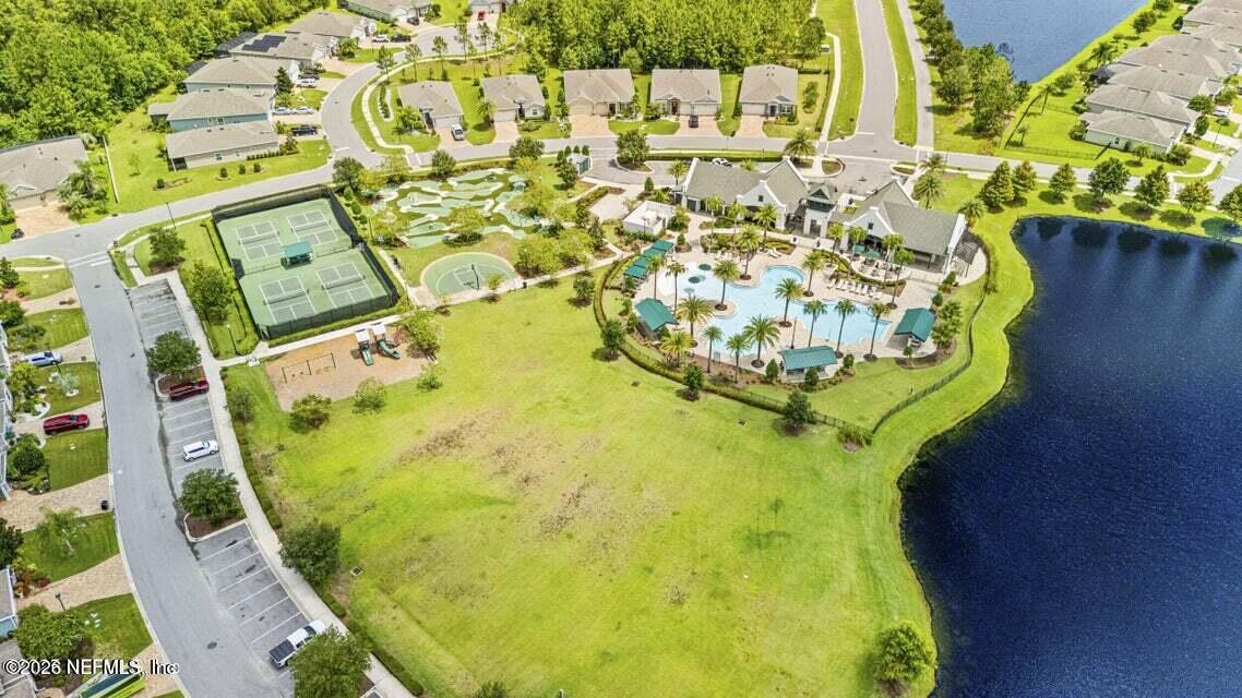 168 St Kitts Loop St. Augustine, FL 32092 - Photo 47 of 47 view of a swimming pool with outdoor seating and plants